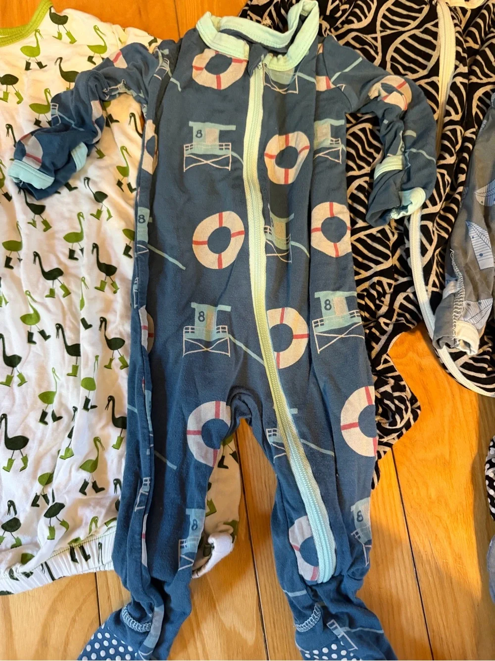 Kickee Pants Mixed Print Footed Sleepers in Blue, Green & Red